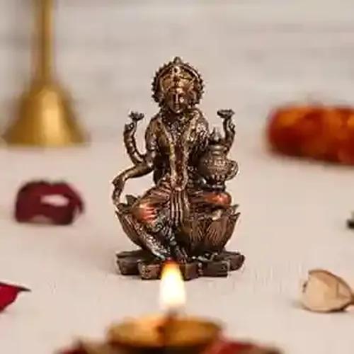 WEBELKART Premium Laxmi Ji Idol Statue for Home and Office Decor| laxmi ji murti for Home and Diwali Pooja Decorations| Diwali Puja Idols (7" Inches, ColdCast Resin)