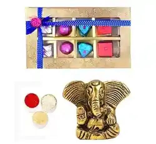 Bhai dooj tika/bhai dooj gift set for brother/bhai dooj tika set/bhai dooj roli chawal set/bhai dooj ke liye thali-Box of fruit and nut chocolate+showpiece figurine+roli chawal chandan