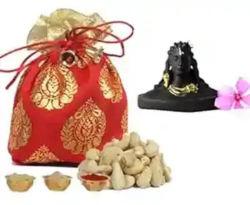 Bhai dooj gift set for brother/bhai dooj tikka/bhai dooj gift for brother/hai dooj tika set/bhaiya dooj gift set-designer potli+cashew (50gms)+showpiece figurine+roli chawal and chandan