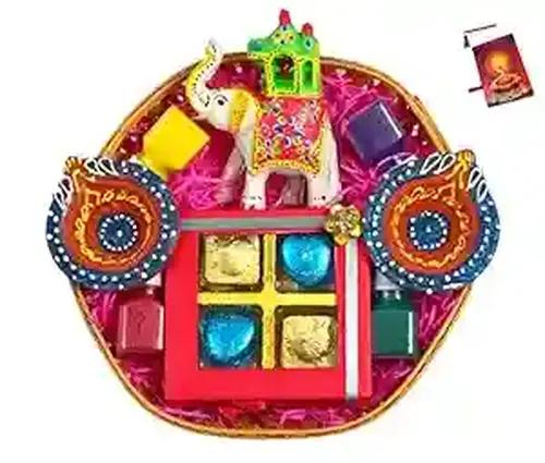 Diwali gifts for friends and family/Diwali gift hampers for employees/Diwali chocolate gift pack-decorated basket+Chocolate box+1 decorative Ambawadi elephnat+2 diya+4 rangoli colours+Diwali card