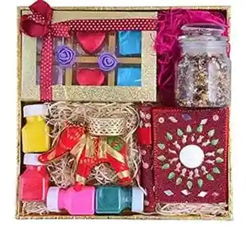 MANTOUSS Diwali Chocolate Gift Pack-1 Designer Tray+1 Handmade Chocolate Box+1 Rajasthani Diary & Pen+1 jar of Chocolate mukhwas(100gms)+1 Elephant Candle tealight Stand+Rangoli Colours+Greeting Card