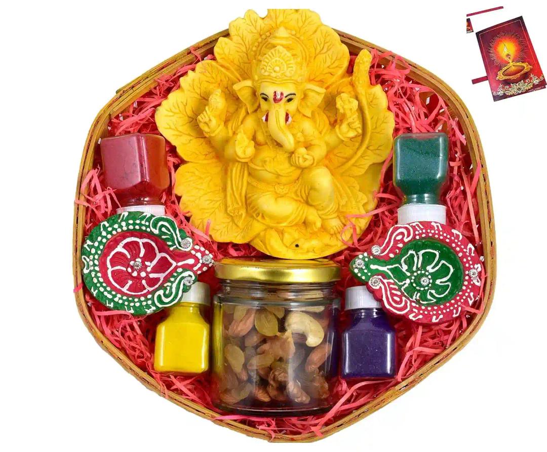 Diwali dry fruits/Diwali dry bruits gift box/Diwali dry fruits-Decorated basket+2 jars(60 gms of almonds and cashew each)+2 elephant candle stand with candles+showpiece figurine+4 rangoli colours+Card